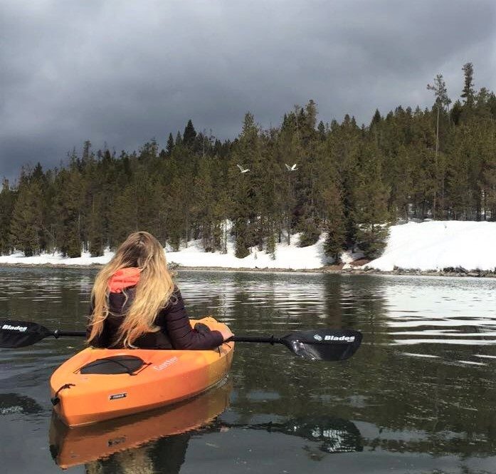 Kayaking in Island Park, Idaho in the South Fork of the Henrys Fork